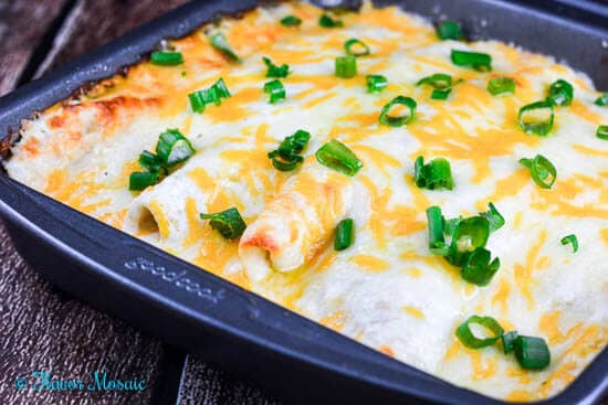 Cheesy Tomatillo Verde Sour Cream Chicken Enchiladas are cheesy, creamy, spicy, chicken enchiladas that are easy to make and your family will love.
