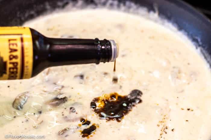 Adding Worcestershire to the creamy mushroom sauce for the green bean casserole.