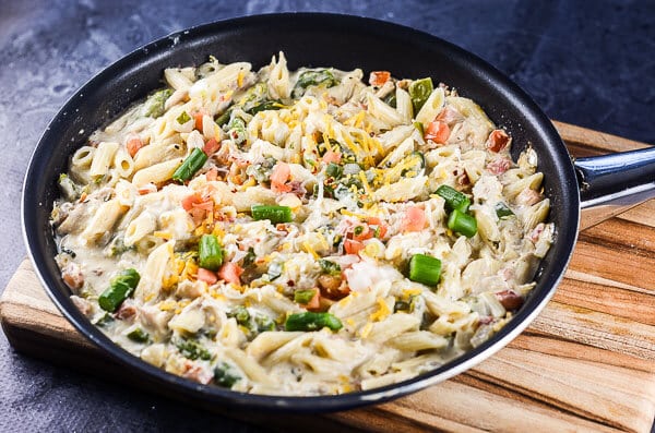 Cheesy Chicken Skillet Pasta is an easy 30-minute one pot meal that is perfect for a quick and easy weeknight dinner.