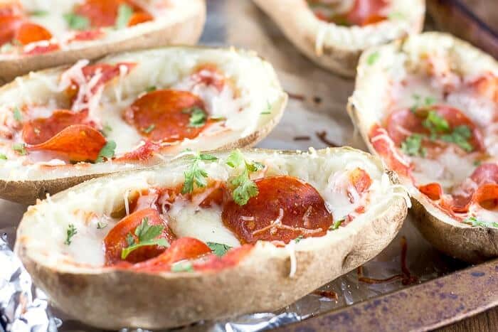These PEPPERONI PIZZA POTATO SKINS taste like pizza on a potato, and make a delicious, fun and kid-friendly appetizer for a party or for tailgating!