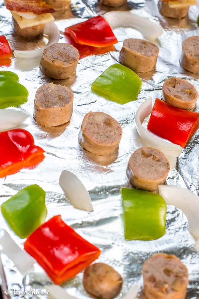 Easy Chicken Sausage and Peppers Sheet Pan Dinner for a quick and easy dinner that is ready in under 30 minutes.