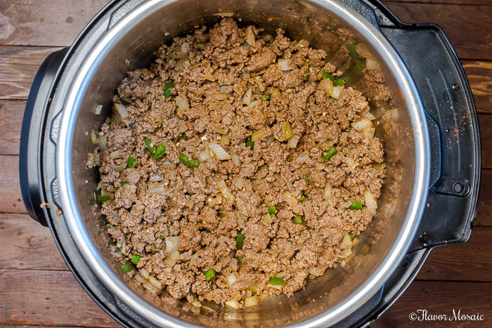 Process photo showing cooked ground beef for Instant Pot Chili
