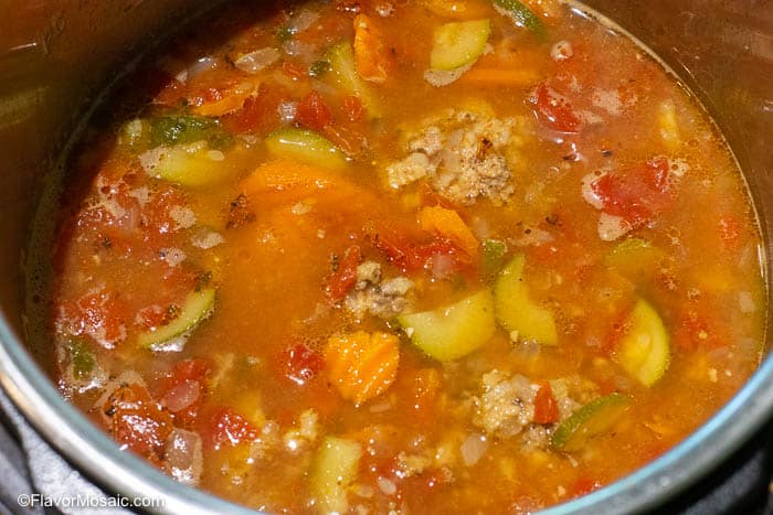 Overhead photo of Albondigas Soup, a Mexican Meatball Soup, in an Instant Pot Pressure Cooker.