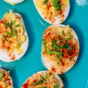 Overhead photo of Southern Deviled Eggs on blue plate