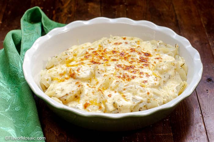Horizontal photo of scalloped potatoes in serving dish.
