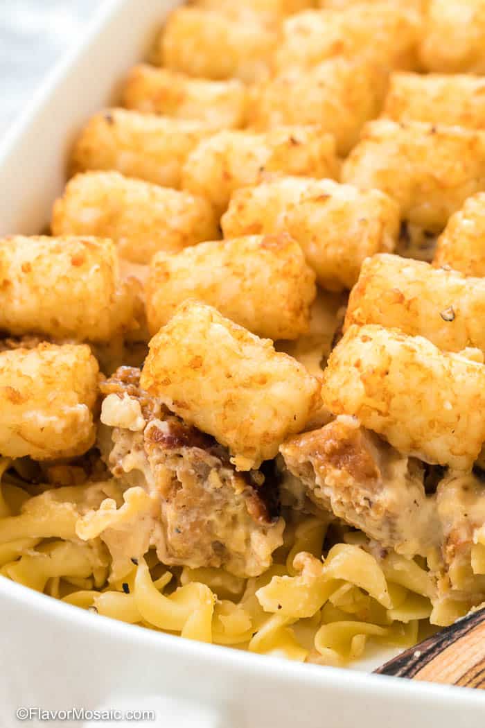 Close up view of inside the Tater Tot Casserole inside the casserole dish.