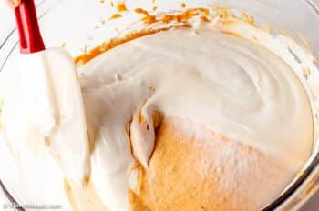 Folding in whipping cream into the Pumpkin Cheesecake Mousse Mixture