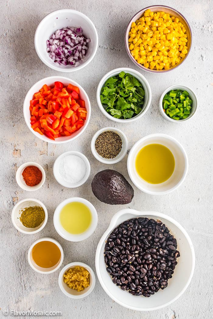 Overhead view of individual ingredients in bowls for Mexican BLack Bean and Corn Salad - Salsa